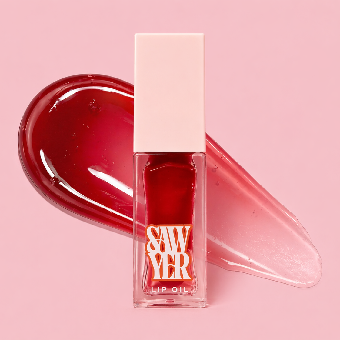 Red lip oil with a pink cap on a pink background