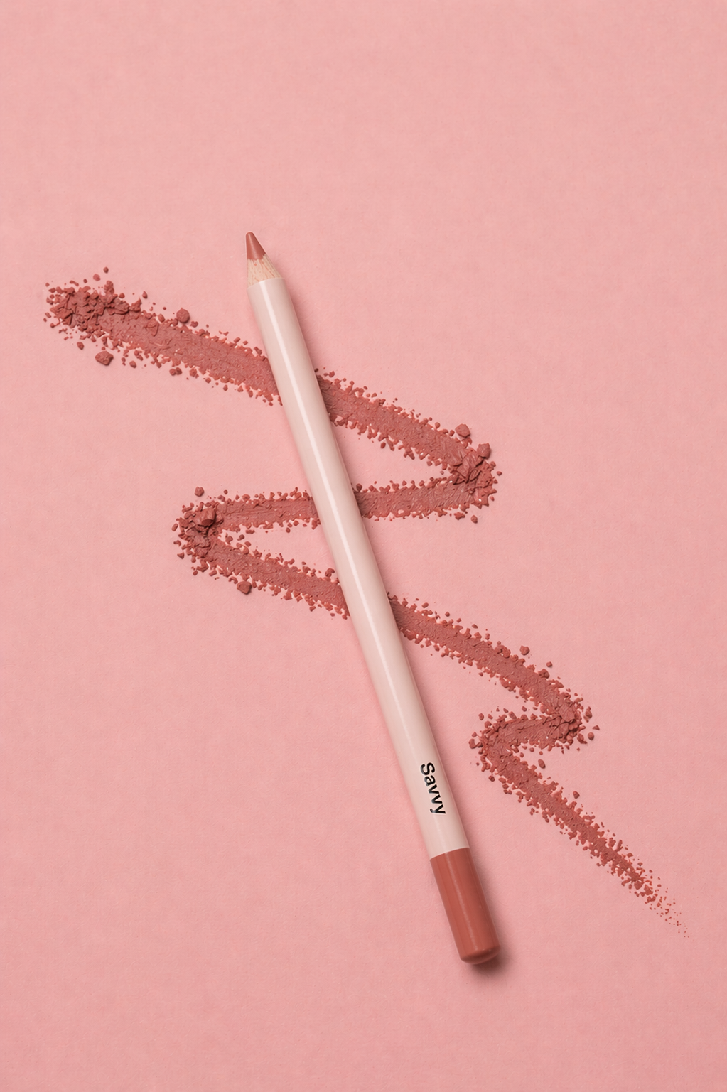 Lip liner pencil with a swatch of color on a pink background