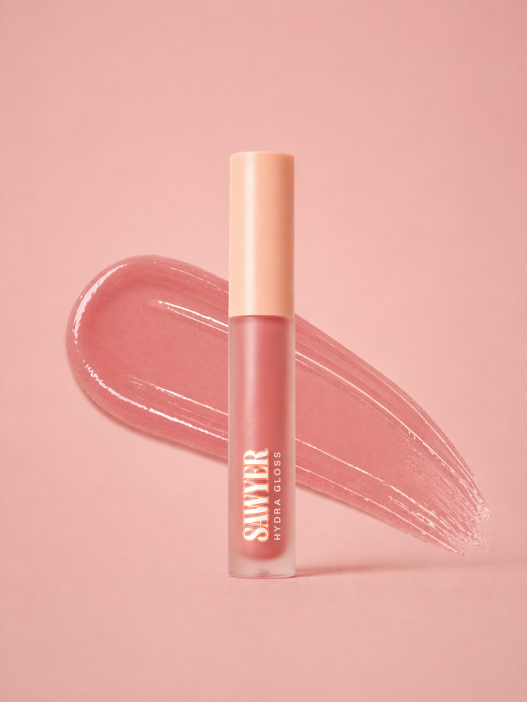 Lip gloss with a swatch on a pink background